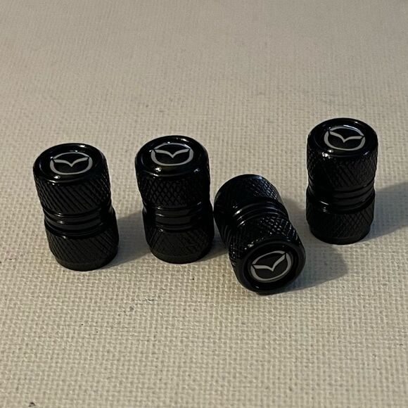 Mazda valve Stem caps in Black set of 4 NWT - Picture 2 of 4